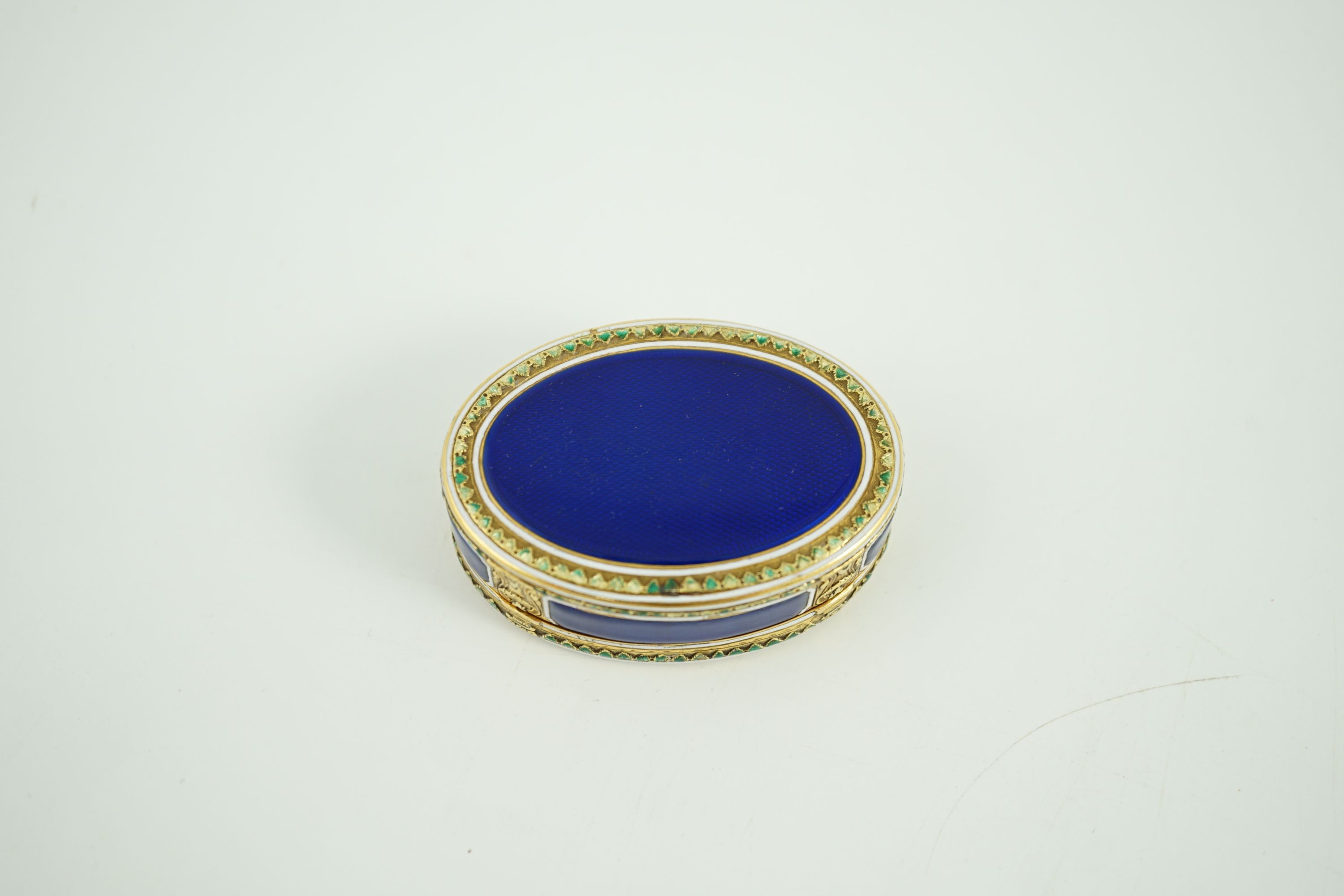 A late 18th/early 19th century French? gold and polychrome enamel oval snuff box